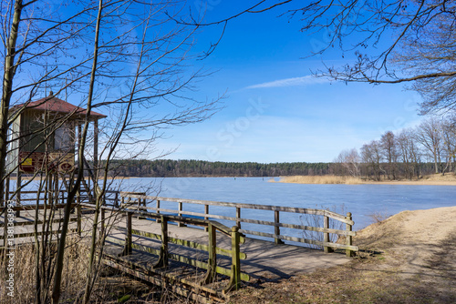 Melting ice on a forest lake