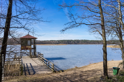 Melting ice on a forest lake