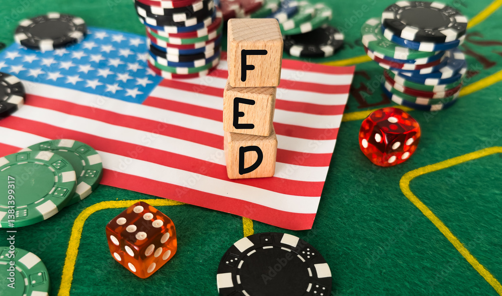 Fototapeta premium FED wording with down arrow and percentage sign on USD dollar banknote for Federal reserve decrease interest rate control which effect to America and world economic growth concept.