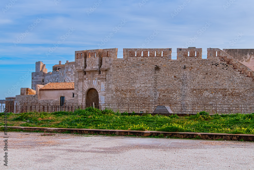 Maniace Castle (Castello Maniace, 1232 -1240) - ancient magnificent citadel and castle at the easternmost point of the Ortygia island. Syracuse, Sicily, Italy.