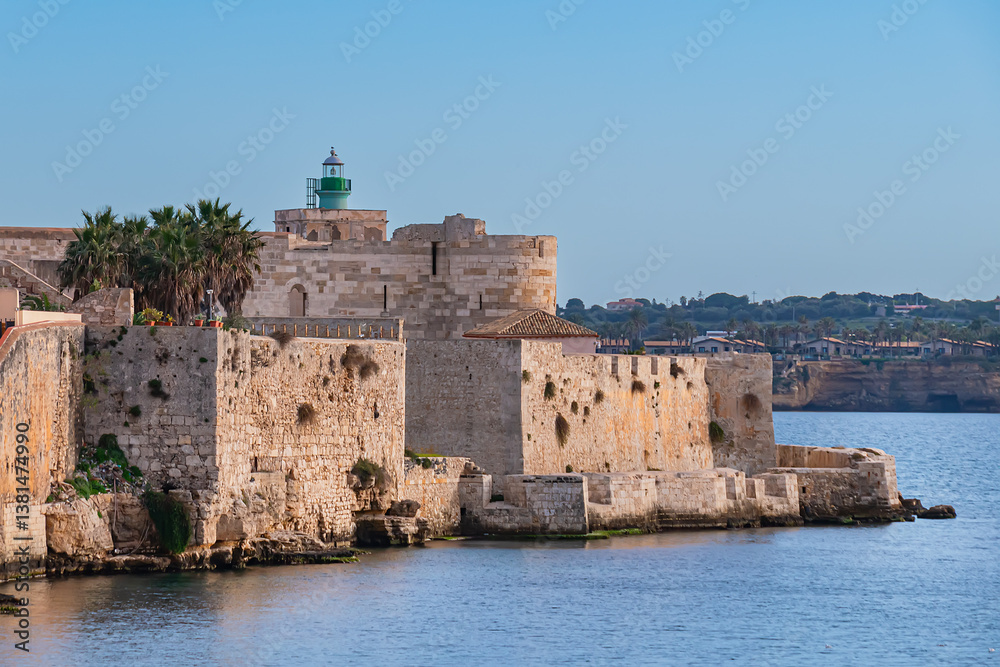 Maniace Castle (Castello Maniace, 1232 -1240) - ancient magnificent citadel and castle at the easternmost point of the Ortygia island. Syracuse, Sicily, Italy.