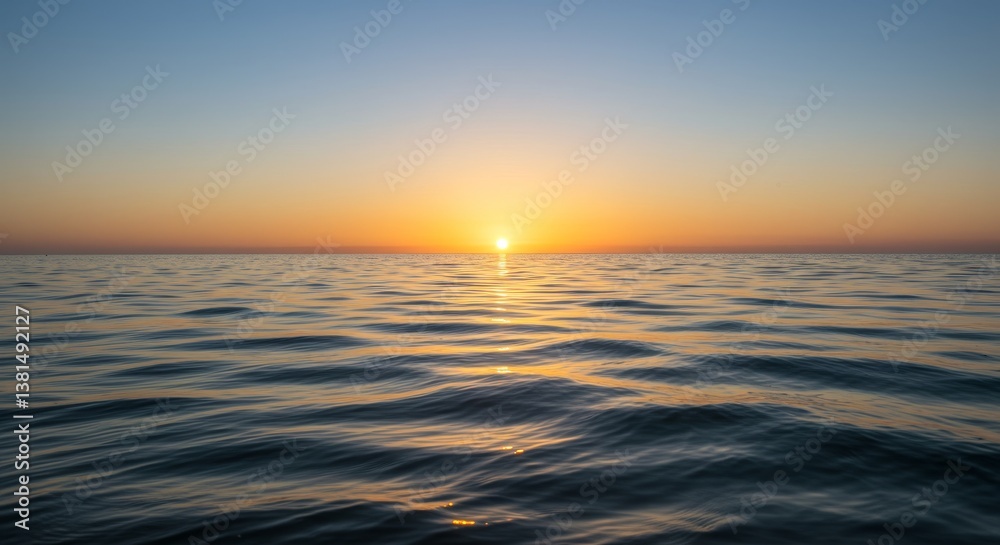 Obraz premium Serene Ocean Sunset - Peaceful ocean scene at sunset, calm water reflecting golden light. Tranquil and idyllic