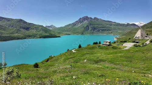 Amazing view of the Mont-Cenis Lake an alpine artificial lake. French Alps. Summer time. Relaxing and green contest. Turquoise water