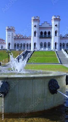 Belarus, Puslovsky Palace, September 5, 2024: Kossovsky Autumn Castle. An old historical castle in Kosovki in sunny autumn weather. An architectural monument in the style of English Neo-Gothic. 4K photo