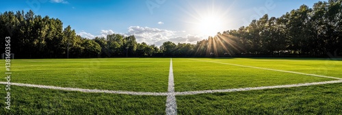 Sun-kissed soccer field, A vibrant green landscape under a radiant sky