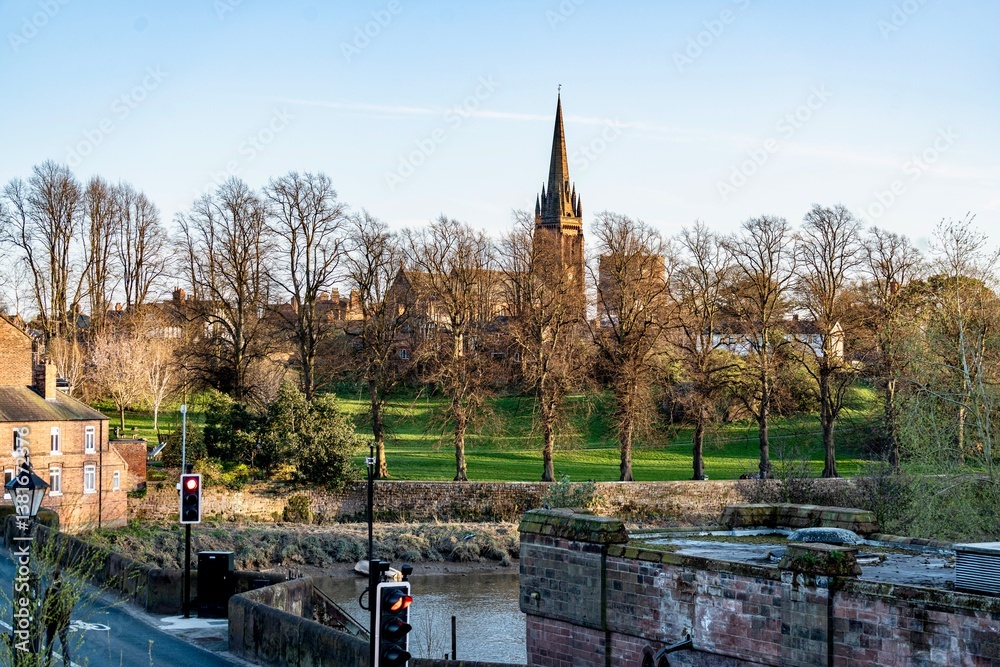 The view of the city of Chester, England as seen from the City Wall that surrounds the interior of the city. The city wall was constructed during the 1st - 3rd centuries