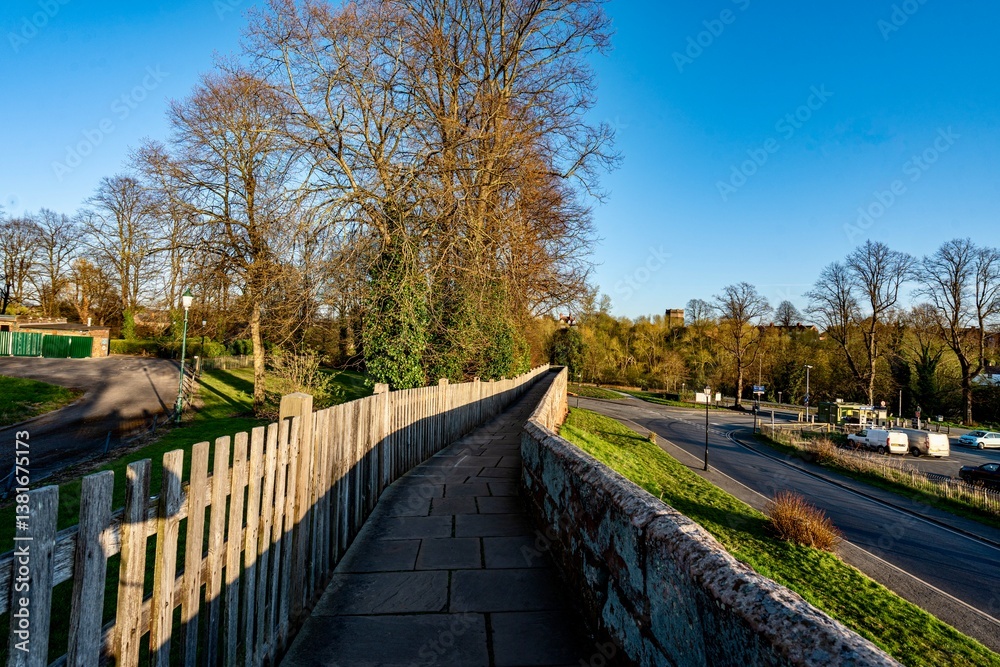 The view of the city of Chester, England as seen from the City Wall that surrounds the interior of the city. The city wall was constructed during the 1st - 3rd centuries