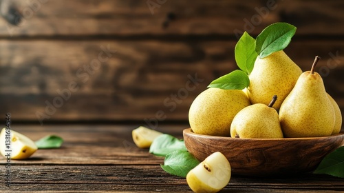 A rustic wooden bowl overflowing with golden yellow pears, accompanied by fresh leaves, gives an inviting and warm touch to the atmosphere, perfect for any kitchen setting.