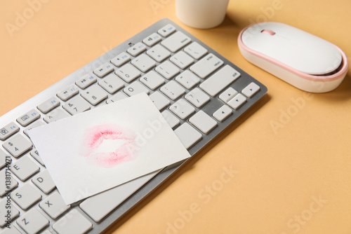 Paper with lipstick kiss ma...