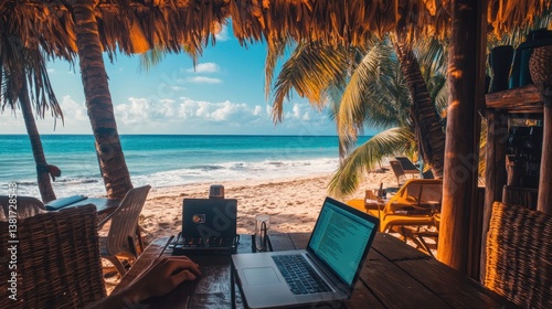 Obraz na płótnie Tropical workspace: Digital nomad coding on a laptop at a breathtaking beach cafe w salonie