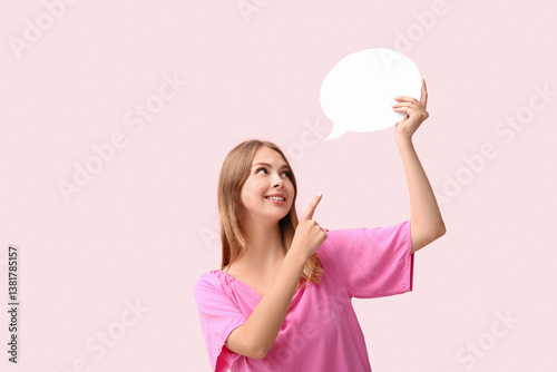 Pretty young woman pointing...