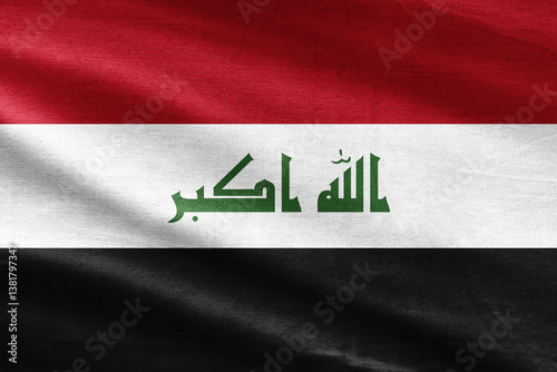 Iraq flag waving in the wind with realistic fabric texture, featuring “Allahu Akbar” Arabic inscription in the center.