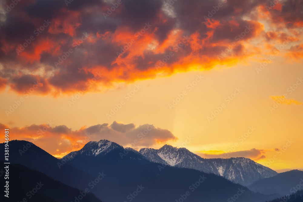 Stunning cloudy sky at dusk with beams of golden sunlight piercing through. The dramatic contrast of light and shadow offers a captivating backdrop for nature, mood, and inspirational photography. Stunning cloudy sky at dusk with beams of golden sunlight piercing through. The dramatic contrast of light and shadow offers a captivating backdrop for nature, mood, and inspirational photography.