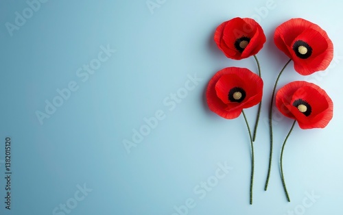 Red poppies with a minimalist approach on a blue backdrop honoring Anzac Day smooth gradients peaceful and respectful image. Blue remembrance day calm.