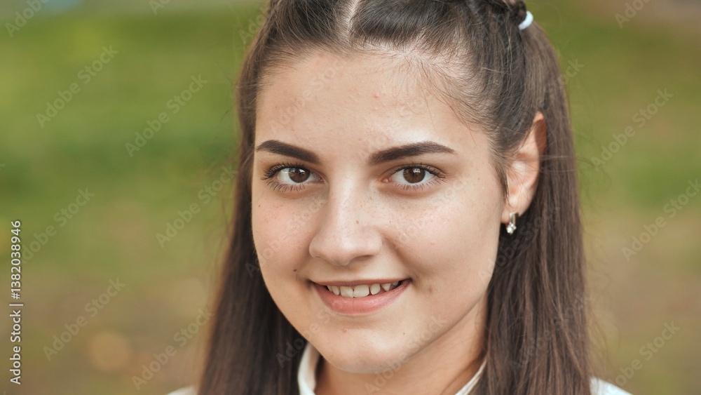 Portrait of a smiling 16 year old girl. Face close up. Portrait of a smiling 16 year old girl. Face close up.