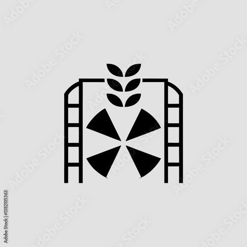 Stylized wheat over a gate with a rotating fan inside