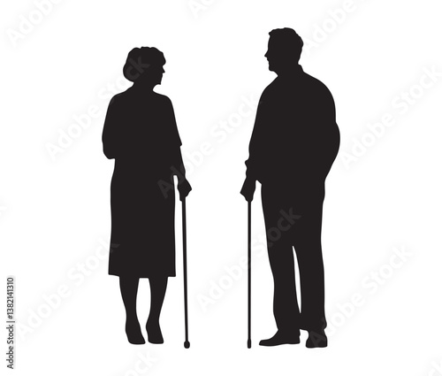 Silhouette of a senior couple. Elderly couple silhouette – senior citizens with walking canes.