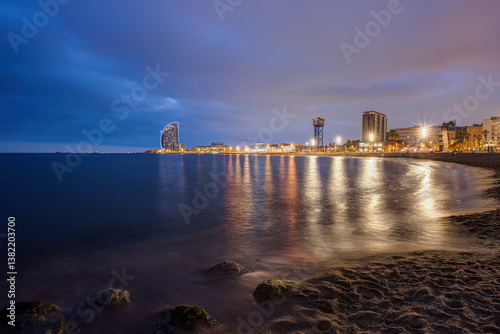 The beach of Barceloneta in Barcelona, Spain, at blue hour