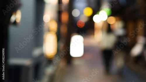 Wallpaper Mural Blurred Figures in Illuminated Urban Passage Torontodigital.ca