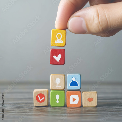 Customer retention concept. Inbound marketing strategy. Attracting potential customers. Hand puts wooden cubes with magnet attracts customer icons on beautiful grey background and copy space. Loyalty