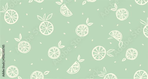 of creamy white and lemon slices on pale green background