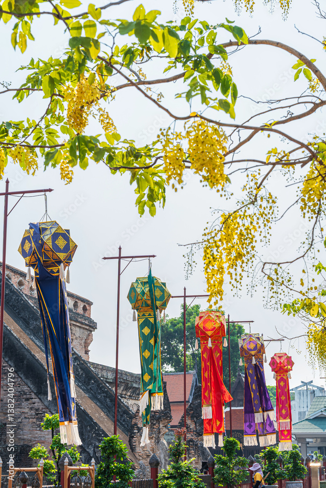 Lanna lantern and Prayer flags tung Hang or Northern traditional flag hang on sand pagoda in the Wat Chedi Luang temple for Songkran Festival is celebrated in a traditional New Year's in Chiang Mai