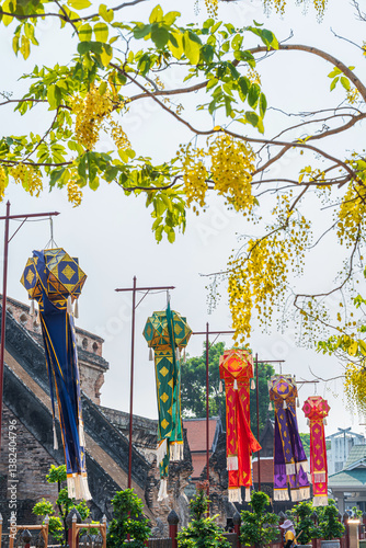 Obraz na płótnie Lanna lantern and Prayer flags tung Hang or Northern traditional flag hang on sand pagoda in the Wat Chedi Luang temple for Songkran Festival is celebrated in a traditional New Year's in Chiang Mai w salonie