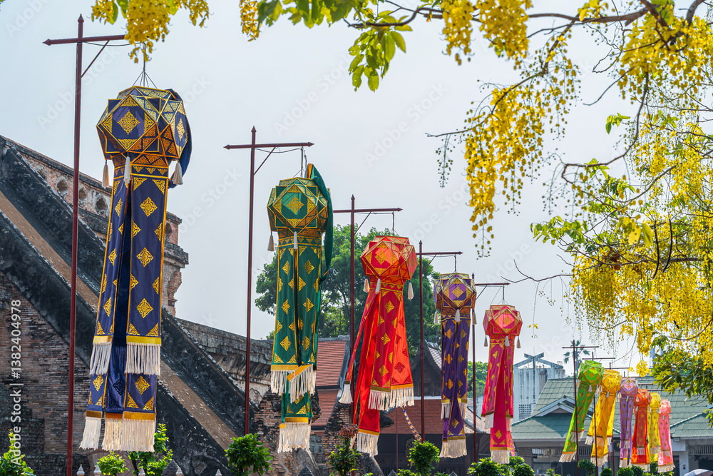 Lanna lantern and Prayer flags tung Hang or Northern traditional flag hang on sand pagoda in the Wat Chedi Luang temple for Songkran Festival is celebrated in a traditional New Year's in Chiang Mai