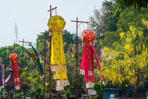 Obraz na płótnie Lanna lantern and Prayer flags tung Hang or Northern traditional flag hang on sand pagoda in the Wat Chedi Luang temple for Songkran Festival is celebrated in a traditional New Year's in Chiang Mai w salonie