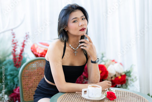 Obraz na płótnie valentine's day, Portrait beautiful asian people woman fashion model in summer Black dress and coffee in cup holding bouquet of red roses in the living room inside or cafe w salonie