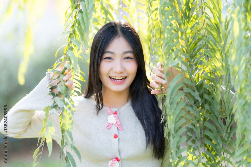 Portrait cute smiles Asian of attractive young teenage girl the cafe on vacation at a coffee shop in spring day