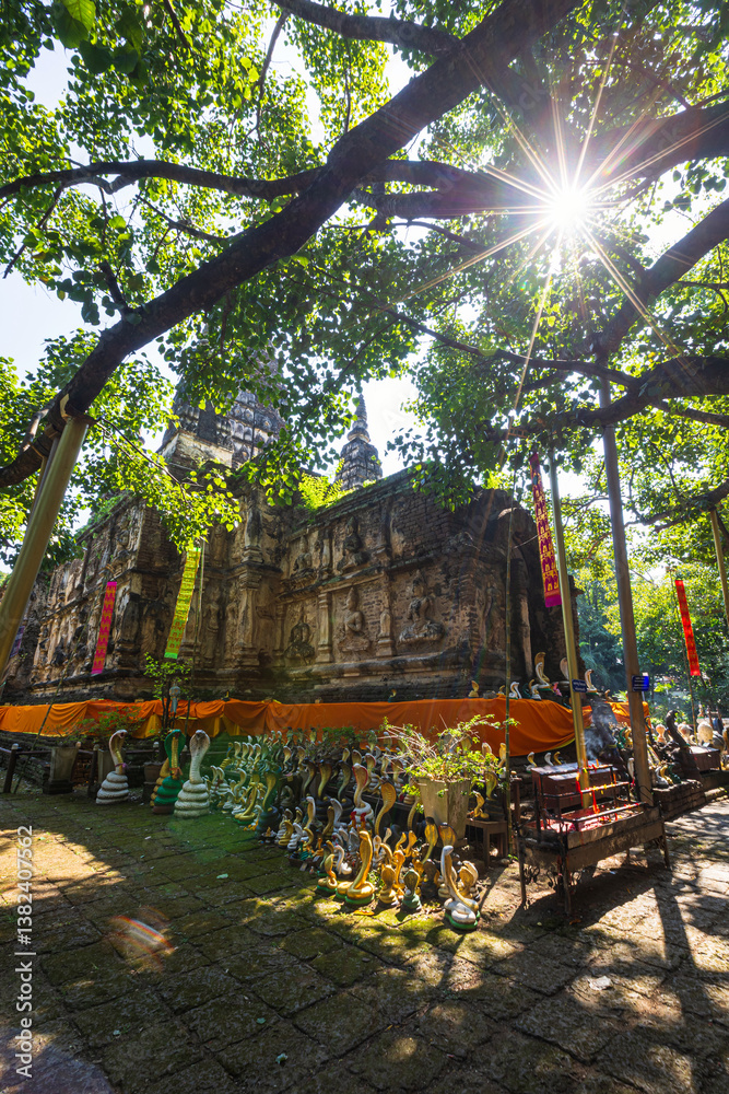 Wat Chet Yot or Wat Photharam Maha Wihan, seven pagoda temple It is a major tourist attraction in Chiang Mai, Thailand.with evening,Temple in Chiang Mai.