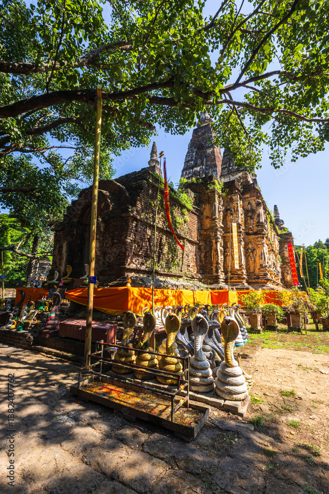 Wat Chet Yot or Wat Photharam Maha Wihan, seven pagoda temple It is a major tourist attraction in Chiang Mai, Thailand.with evening,Temple in Chiang Mai.