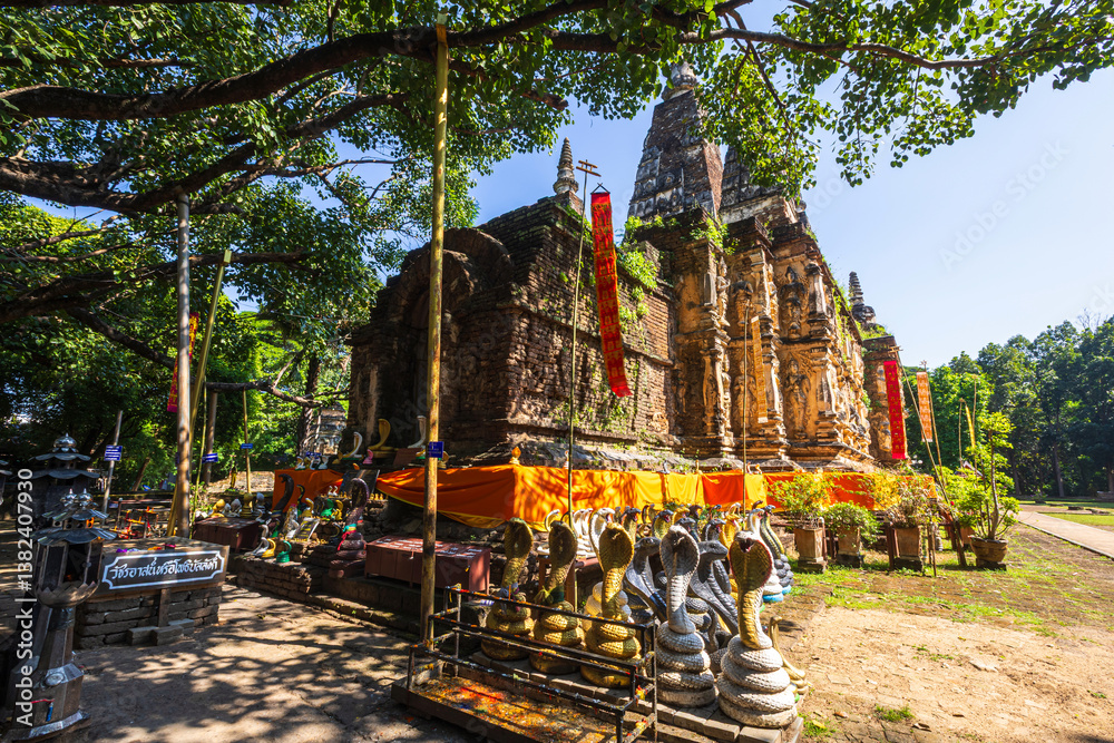 Wat Chet Yot or Wat Photharam Maha Wihan, seven pagoda temple It is a major tourist attraction in Chiang Mai, Thailand.with evening,Temple in Chiang Mai.