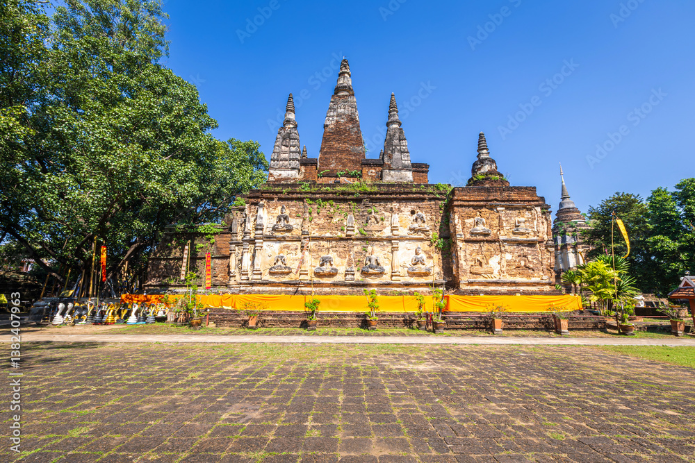 Wat Chet Yot or Wat Photharam Maha Wihan, seven pagoda temple It is a major tourist attraction in Chiang Mai, Thailand.with evening,Temple in Chiang Mai.