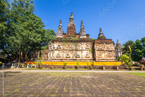 Obraz na płótnie Wat Chet Yot or Wat Photharam Maha Wihan, seven pagoda temple It is a major tourist attraction in Chiang Mai, Thailand.with evening,Temple in Chiang Mai. w salonie