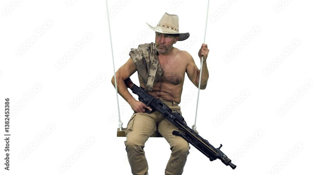 Cinematic style of mercenary soldier in cowboy hat sitting on rope swing with machine gun, Full HD footage with alpha transparency channel isolated on white background Cinematic style of mercenary soldier in cowboy hat sitting on rope swing with machine gun, Full HD footage with alpha transparency channel isolated on white background