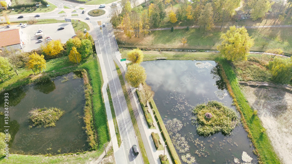 Overhead view of ponds near rural road autumn
