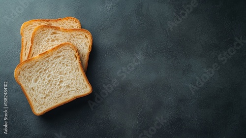 Three slices of bread on a counter