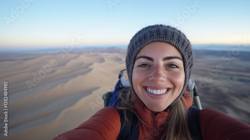 Obraz na płótnie woman smiling in desert landscape, showcasing her adventurous spirit and love for nature. vast dunes create stunning backdrop, highlighting beauty of exploration w salonie