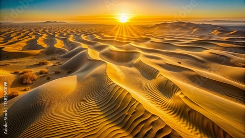 Fototapeta Naklejka Na Ścianę i Meble -  Aerial Desert Dunes Sunset: Golden Sand Patterns, Bird's Eye View,  Architectural Photography
