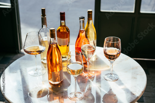 Different types of wine in glasses - red, white, rose and amber. Wine tasting in a bar or restaurant.