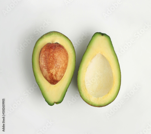 Fresh avocado slices on a white background. Top view.