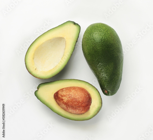 Group of fresh avocados on a white background. Top view.