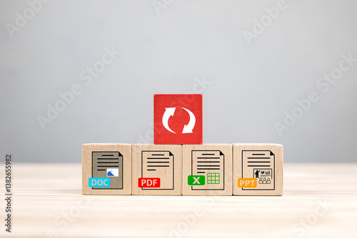 Document file extension icon on wooden block. concept of technology transforms document, convert files and edit digital formats.