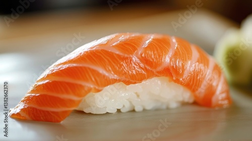 Close-up capture showcasing a piece of fresh salmon nigiri sushi perfection