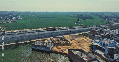 Wallpaper Mural Aerial view of an Indian City and agricultural fields near the Delhi-Chandigarh Highway in Punjab, India. Natural texture for the background. The picturesque countryside of India. Healthy food concept Torontodigital.ca