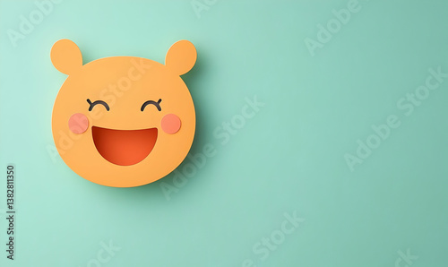 Simple Smiley Face Cutout on Light Green Background for Fun Decor