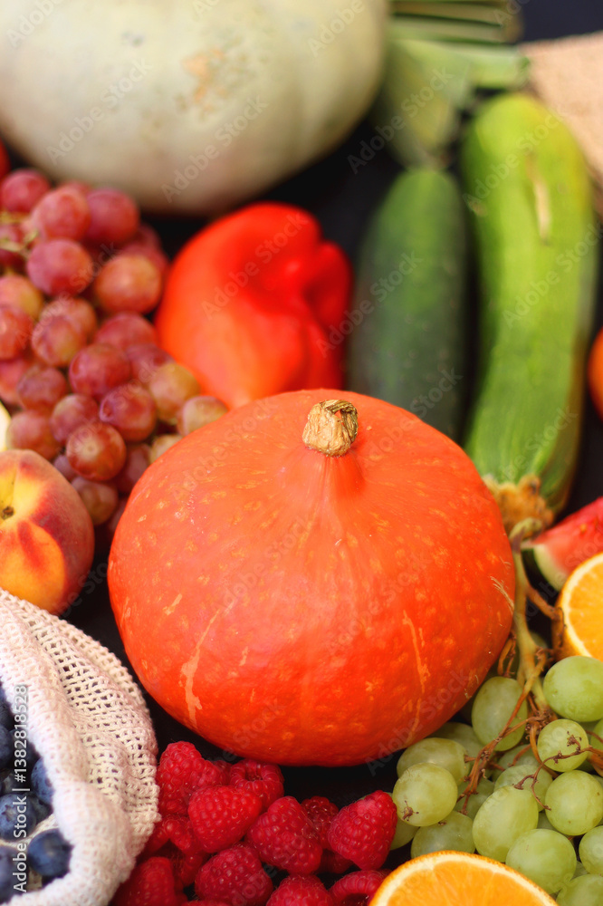 Various healthy fruits, vegetables and cereals on dark background. Selective focus.