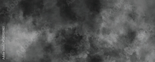 Aged and rustic cloudy ink texture in dark gray and black with a vintage effect

